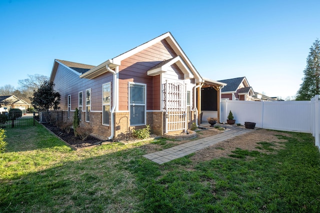 view of front of home with a front lawn