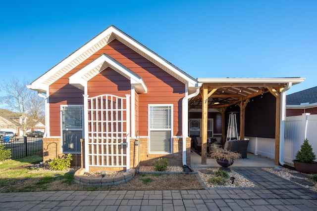 view of front of home with a patio