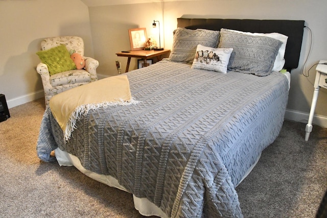 bedroom with dark carpet