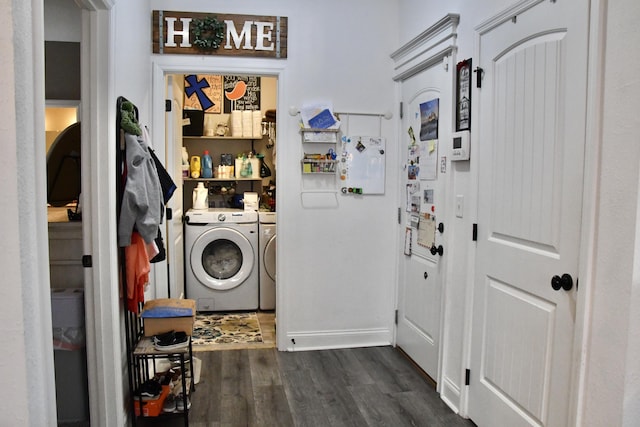 laundry room with dark hardwood / wood-style floors and independent washer and dryer