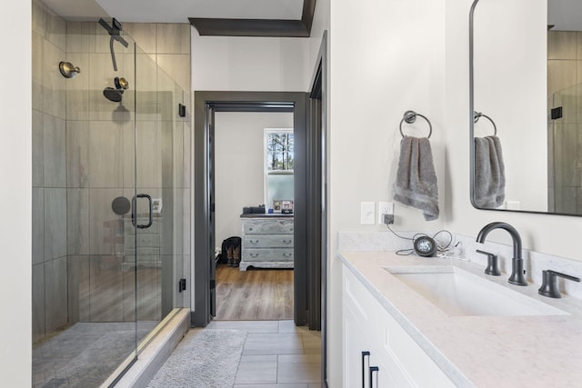 bathroom with vanity and an enclosed shower