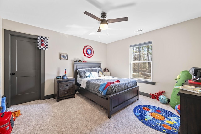 carpeted bedroom with ceiling fan