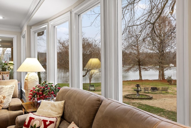 sunroom / solarium with a water view