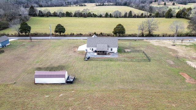 birds eye view of property featuring a rural view