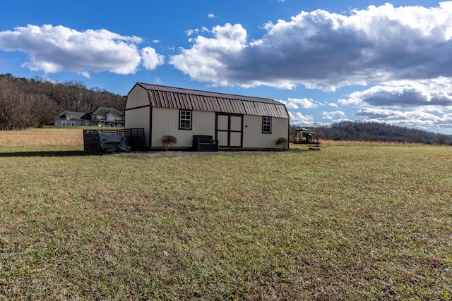 view of outdoor structure with a yard