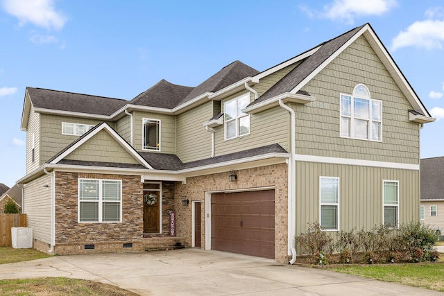 craftsman-style house featuring a garage