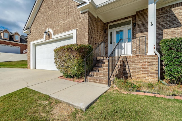 view of exterior entry with a garage