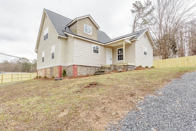 view of front of home with a front lawn