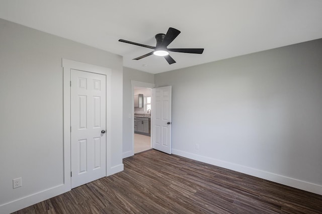 1317 Gadd Rd, Hixson, TN 37343 - unfurnished bedroom with dark wood-style flooring and ceiling fan