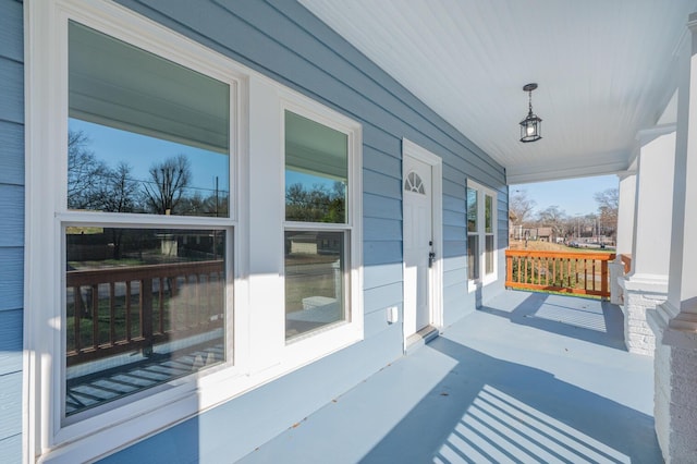 balcony featuring a porch