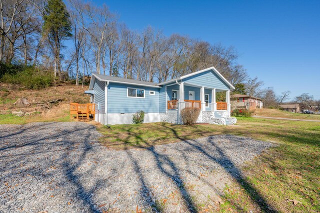 1317 Gadd Rd, Hixson, TN 37343 - view of front of property featuring covered porch and a front lawn