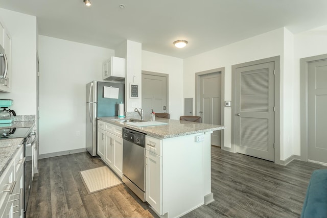 kitchen featuring light stone countertops, appliances with stainless steel finishes, dark wood-type flooring, sink, and white cabinetry