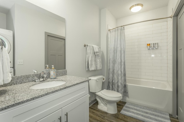 full bathroom with shower / bath combo, vanity, hardwood / wood-style flooring, and toilet