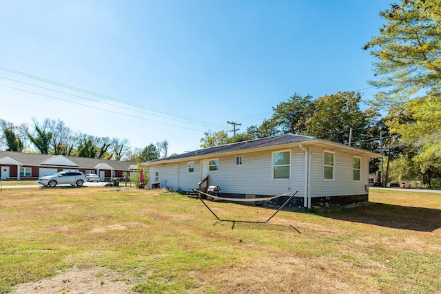 exterior space featuring a yard