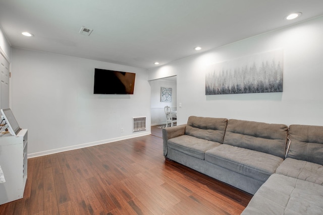 living room featuring dark hardwood / wood-style floors