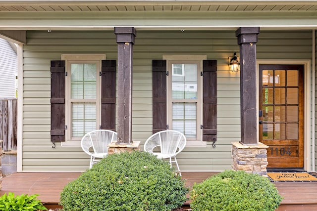 doorway to property featuring a porch