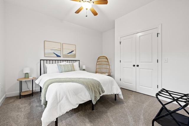 bedroom featuring carpet, ceiling fan, and a closet