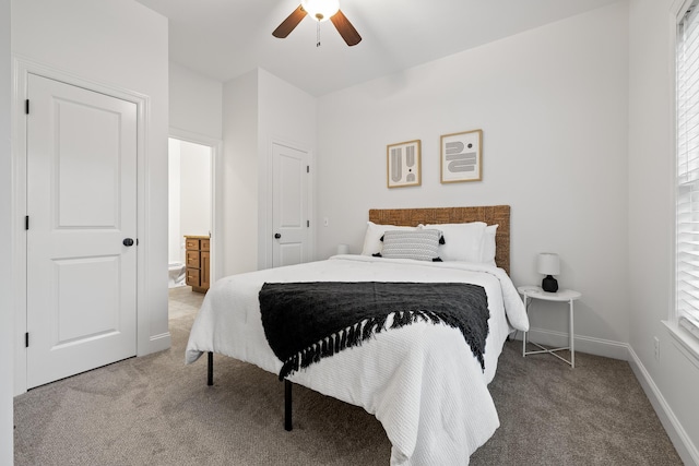 carpeted bedroom with ceiling fan