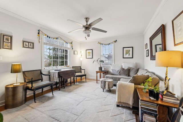 living room featuring crown molding, ceiling fan, and light carpet