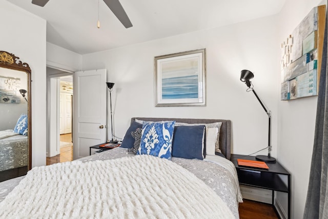 bedroom featuring ceiling fan and hardwood / wood-style floors