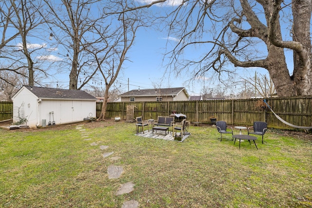 view of yard featuring an outbuilding and a patio area