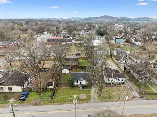 drone / aerial view featuring a mountain view