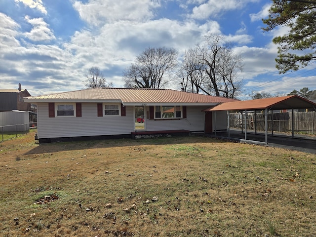 view of front of house featuring a front yard and a carport