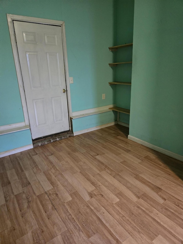 unfurnished room featuring light hardwood / wood-style floors