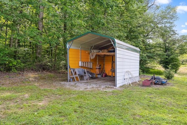 view of outbuilding featuring a lawn