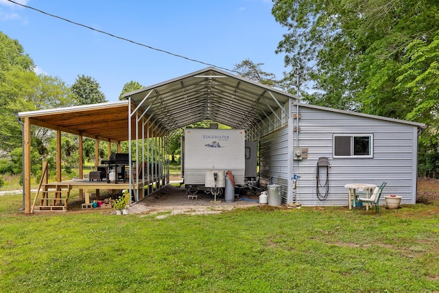 exterior space featuring a yard and a carport