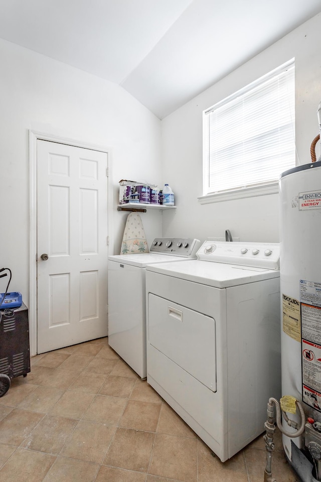 laundry area with separate washer and dryer and gas water heater