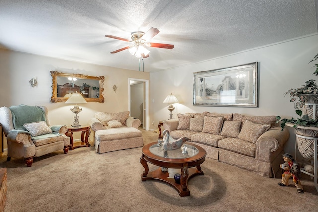 carpeted living room with ceiling fan and a textured ceiling