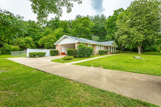 view of property's community featuring a lawn