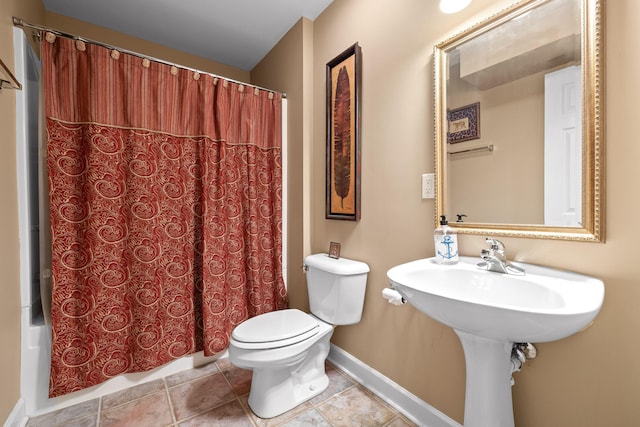 bathroom featuring toilet, shower / bathtub combination with curtain, and tile patterned flooring