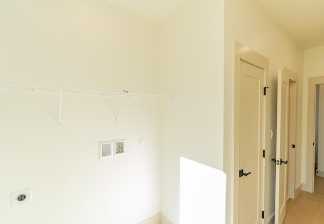 laundry area featuring washer hookup and electric dryer hookup