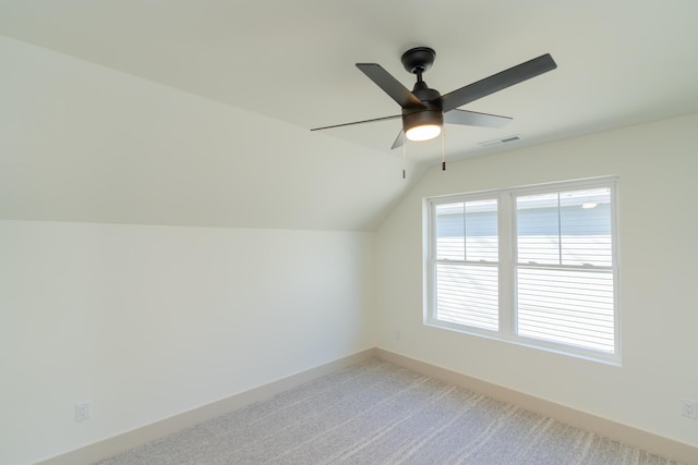 bonus room with carpet, ceiling fan, and lofted ceiling