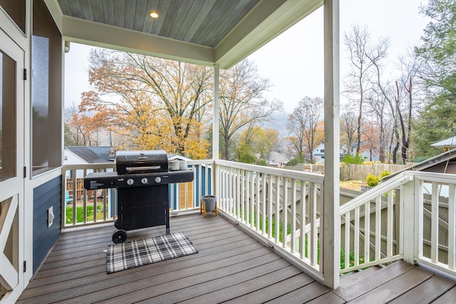 wooden deck featuring grilling area