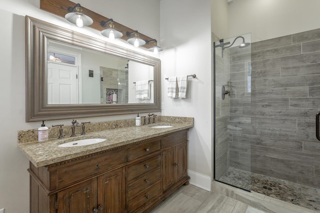 bathroom with vanity and an enclosed shower