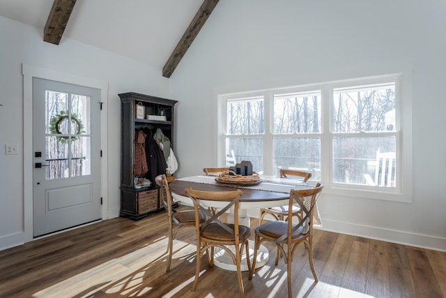 dining space featuring hardwood / wood-style flooring, high vaulted ceiling, and beamed ceiling