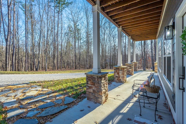 view of patio featuring a porch