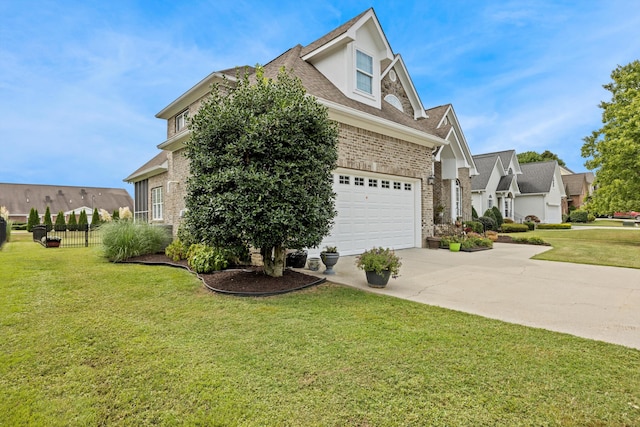 view of front of home with brick siding, concrete driveway, a garage, a residential view, and a front lawn