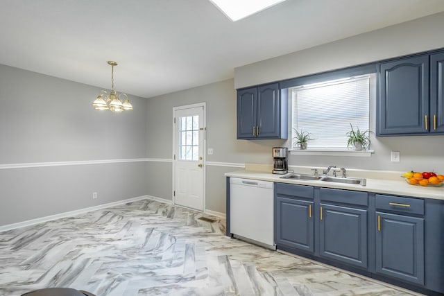 kitchen featuring white dishwasher, sink, blue cabinets, and hanging light fixtures