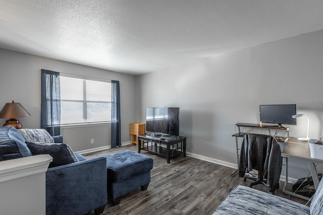 living room featuring a textured ceiling and dark hardwood / wood-style flooring