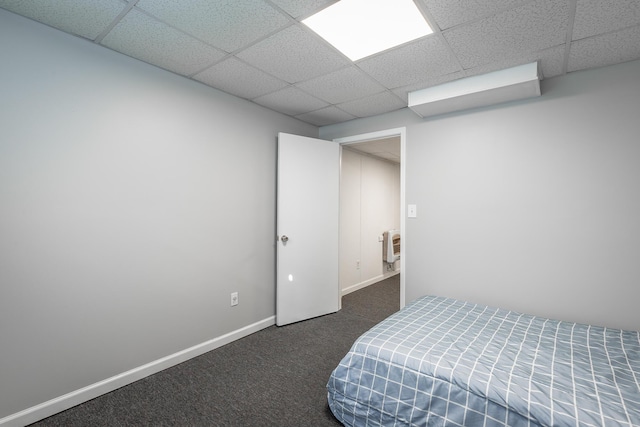 bedroom with dark colored carpet