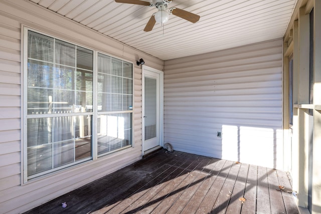 wooden deck with ceiling fan