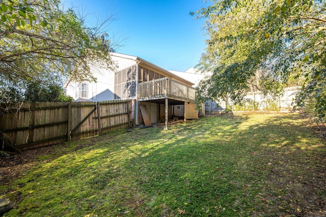 view of yard with a wooden deck