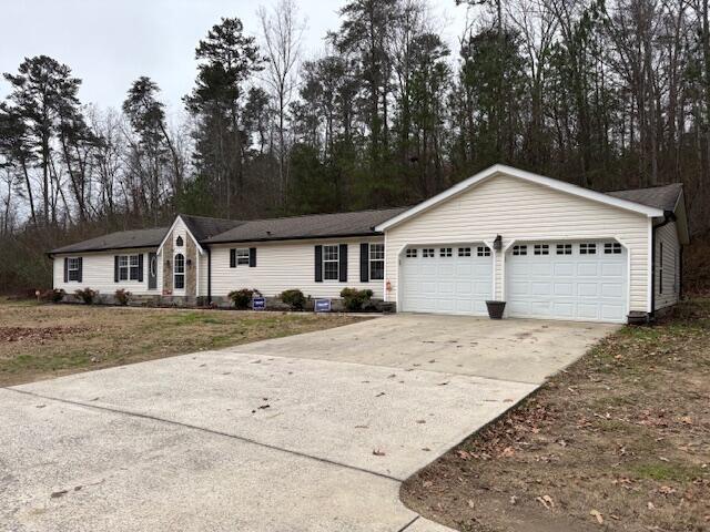 ranch-style home with a garage