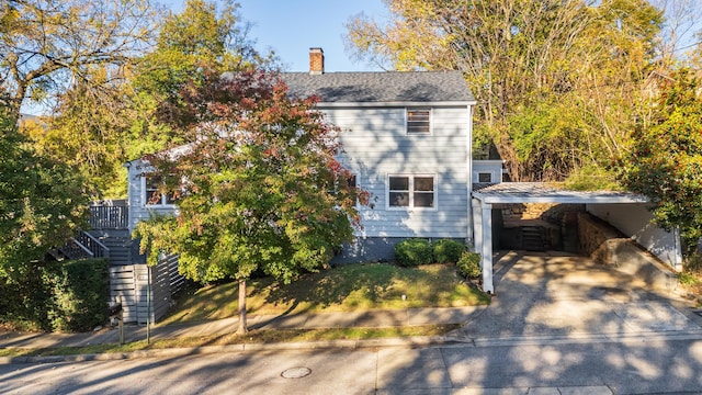 view of front of house with a carport