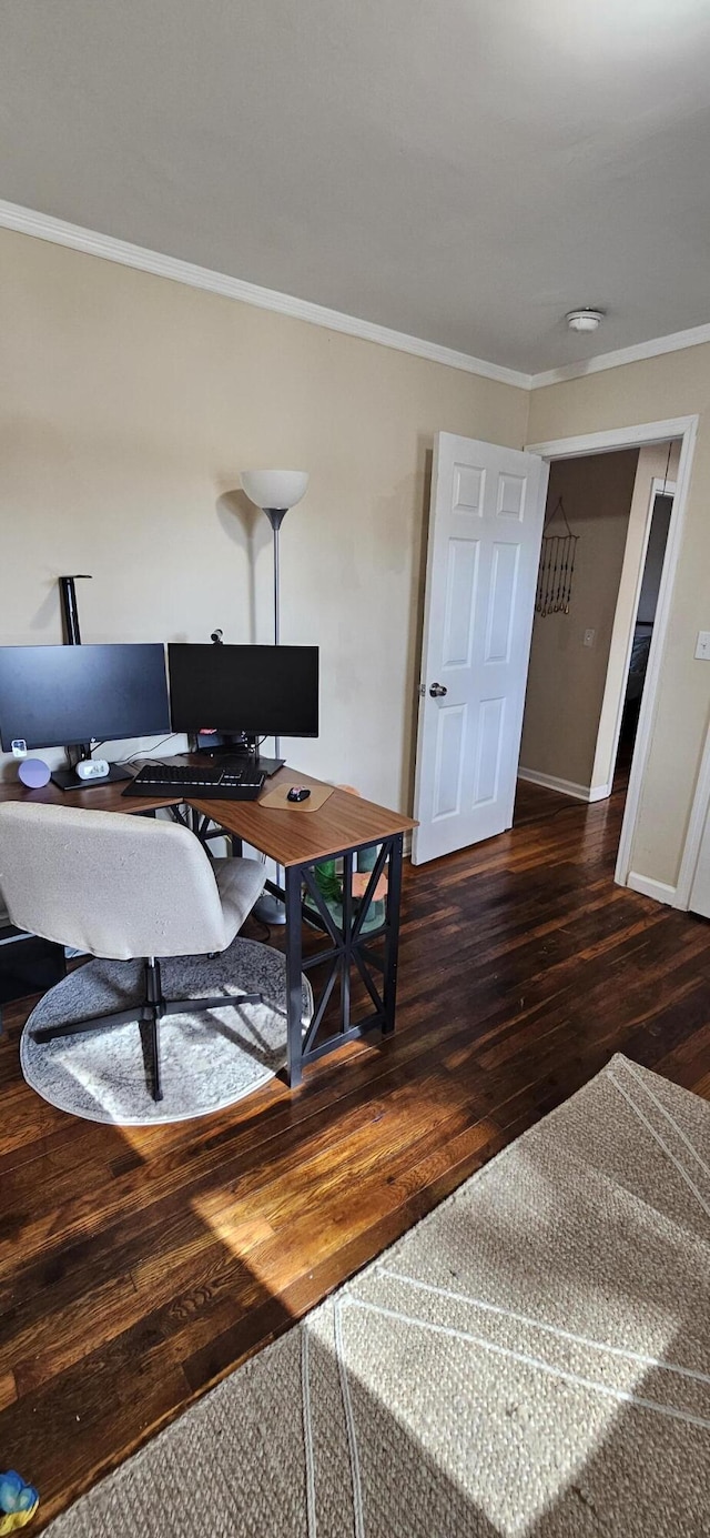 office featuring dark hardwood / wood-style floors and ornamental molding