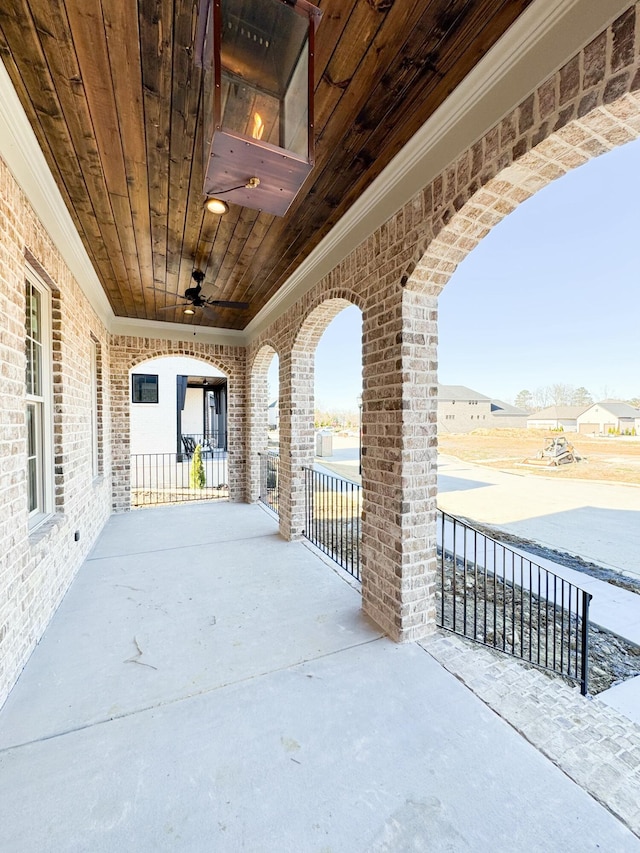 view of patio / terrace featuring ceiling fan and covered porch